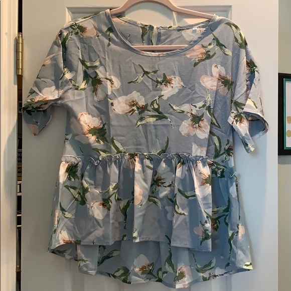 A cute peplum top. - Picture 1 of 3